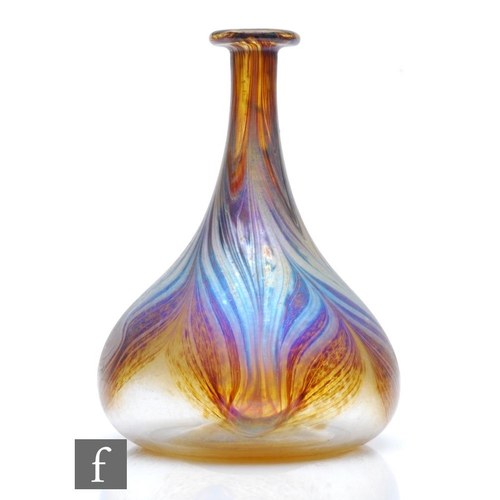 1251 - Peter Layton - A contemporary studio glass vase of conical form with flat rim, decorated with a pull... 