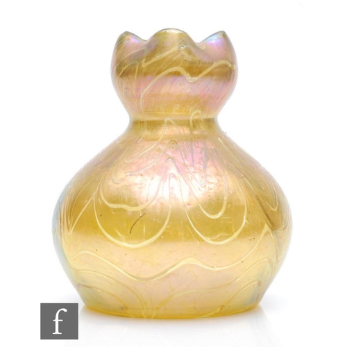 43 - Loetz - An early 20th Century glass vase of shouldered ovoid form with quatrefoil neck, decorated in... 