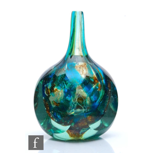 835 - Mdina - A later 20th Century glass vase with slice cut body and tapered drawn collar neck with inter... 