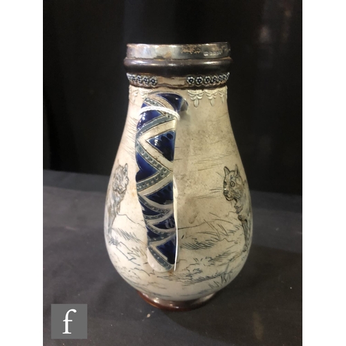 83 - Hannah Barlow - Doulton Lambeth - A late 19th Century stoneware jug decorated to the body with four ... 