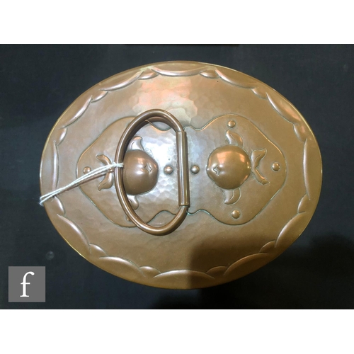 94 - Newlyn - An early 20th Century Arts and Crafts copper tea caddy of oval form decorated with oranges ... 