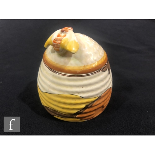 244 - Clarice Cliff - Coral Firs - A small size Beehive honey pot circa 1933, hand painted with a tonal br... 