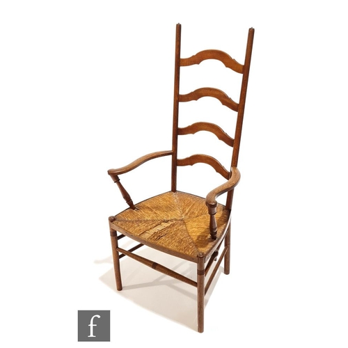 103 - William Birch - Liberty & Co - An oak ladder back open armchair with ring turned capitals over a... 