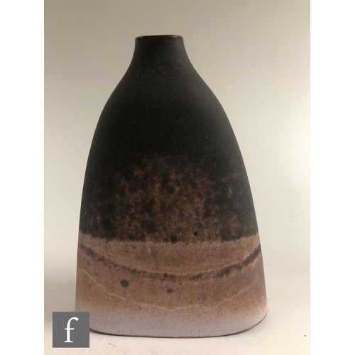 1204 - Emily Myers - A later 20th Century studio pottery vase of compressed form decorated with a tonal mat... 