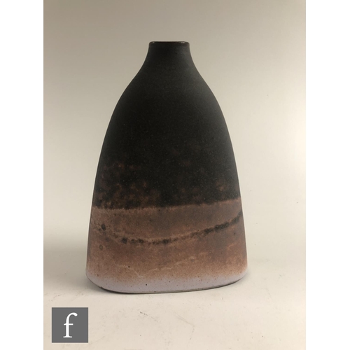 1204 - Emily Myers - A later 20th Century studio pottery vase of compressed form decorated with a tonal mat... 