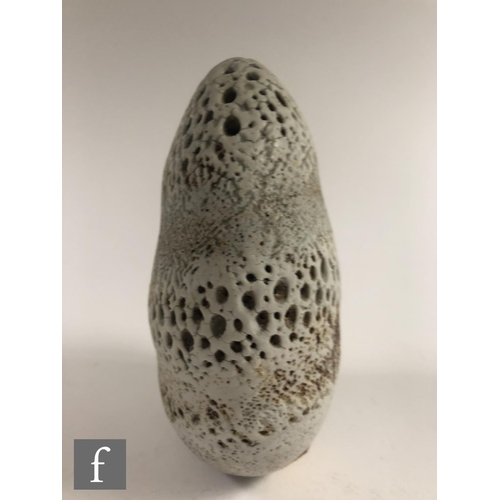 718 - Alan Wallwork - A studio pottery seed form of compressed oval section with incised and stippled deco... 