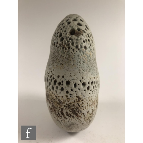 718 - Alan Wallwork - A studio pottery seed form of compressed oval section with incised and stippled deco... 