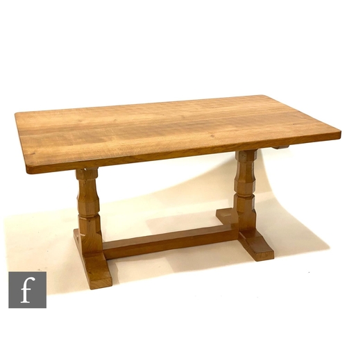 1449 - Robert 'Mouseman' Thompson - A late 20th Century oak twin pedestal refectory dining table, the adzed... 