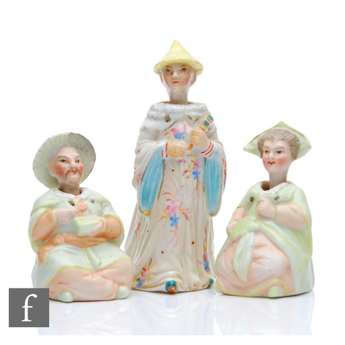 124 - Three late 19th Century bisque East Asian nodding figures comprising a seated lady and gentleman, sh... 