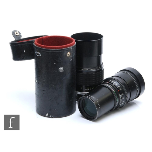 1090 - Two telephoto camera lenses, to include a Nikon AF 180mm f/2.8 Nr. 368852 and Hasselblad Carl Zeiss ... 