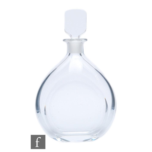 205 - A 20th Century Orrefors clear crystal glass decanter of shouldered ovoid form with slice cut body be... 