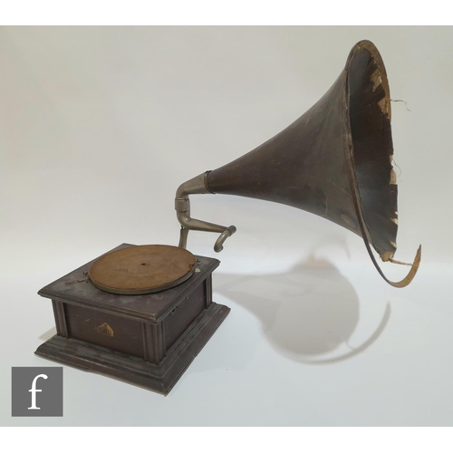 1083 - An HMV gramophone with original wooden horn, exhibition sound box on mahogany base A/F and a leather... 