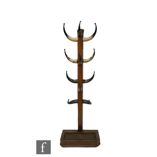 1326 - A Victorian eleven branch mahogany hall stand, each branch in the form of a cow horn terminating in ... 