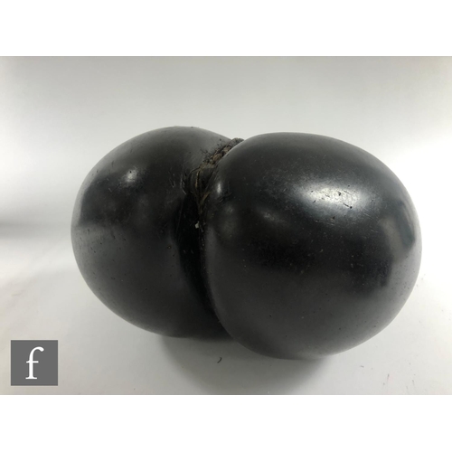 590 - A coco de mer or sea coconut, height 30cm.NB - Subject to CITES Annex C listing, this lot will requi... 