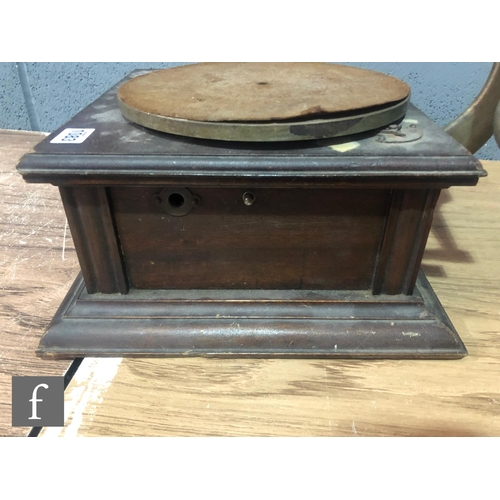 1083 - An HMV gramophone with original wooden horn, exhibition sound box on mahogany base A/F and a leather... 