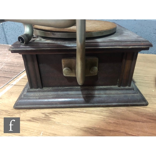 1083 - An HMV gramophone with original wooden horn, exhibition sound box on mahogany base A/F and a leather... 