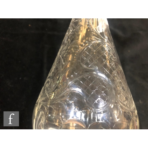 264 - A Stevens & Williams clear crystal decanter circa 1910, the slender bottle form body with lobe m... 