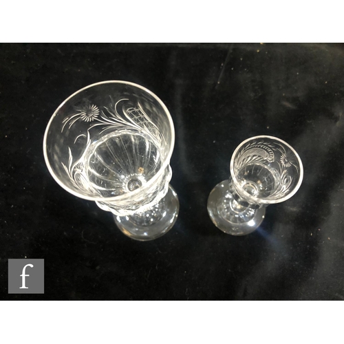 266 - A pair of Stevens & Williams clear crystal decanters circa 1910, the slender bottle form body wi... 