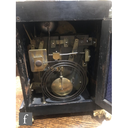 541 - A late 19th Century George III style ebonised cased bracket clock, the arch dial incorporating a sil... 