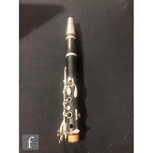 567 - A pair of early 20th Century clarinets by Buffet A Paris, ebonised case with nickel fittings, in plu... 