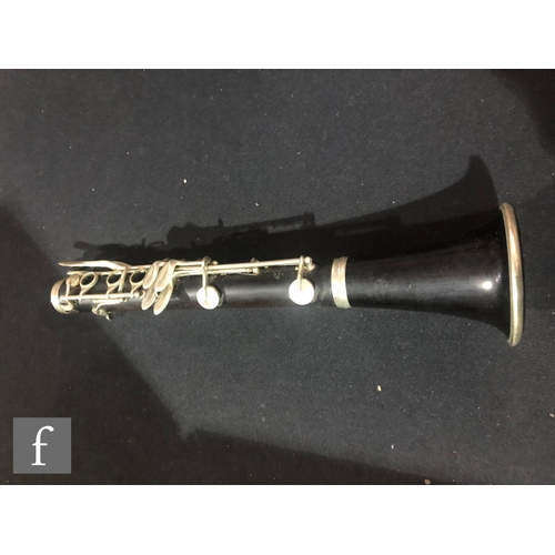 567 - A pair of early 20th Century clarinets by Buffet A Paris, ebonised case with nickel fittings, in plu... 