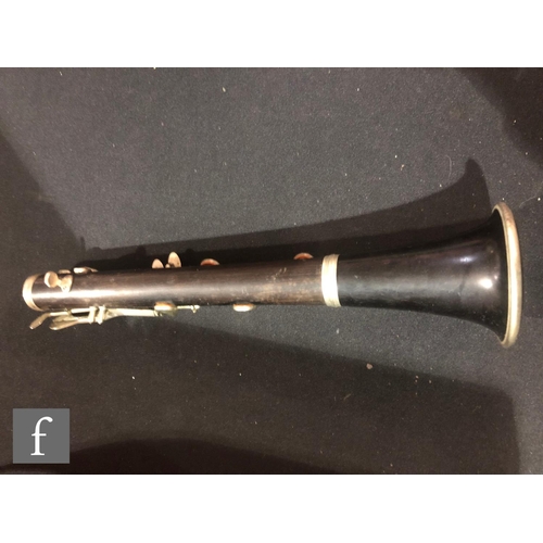 567 - A pair of early 20th Century clarinets by Buffet A Paris, ebonised case with nickel fittings, in plu... 