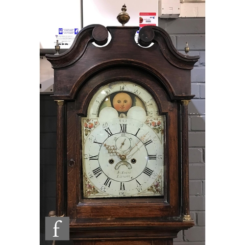 1329 - An early 19th Century oak longcase clock with an eight-day movement, the 12 inch broken arch moonpha... 