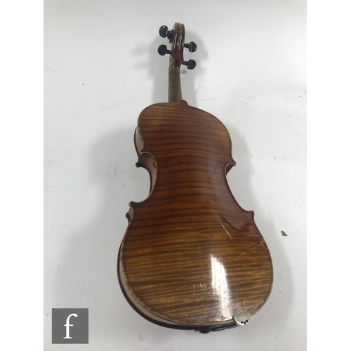 514 - A 20th Century violin labelled JTL Vitouse, length 36cm, with two bows, cased.