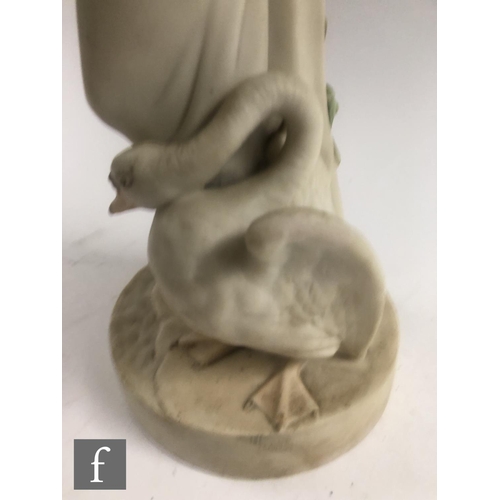 47 - A large 19th Century W.H Goss Parian model depicting Leda and the Swan, the scantily clad female hol... 