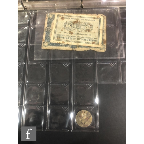 597 - A small album of George III to George VI silver, nickel and copper coinage including tokens. (qty)