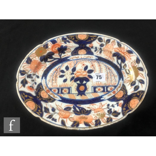 75 - A large 19th Century Davenport Chinoiserie meat plate decorated in the Imari palette with a stylised... 