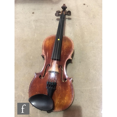 574 - A late 19th early 20th Century violin, length 34cm, with bow, in modern blue zip case and with origi... 