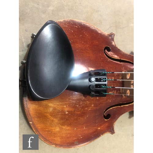 574 - A late 19th early 20th Century violin, length 34cm, with bow, in modern blue zip case and with origi... 