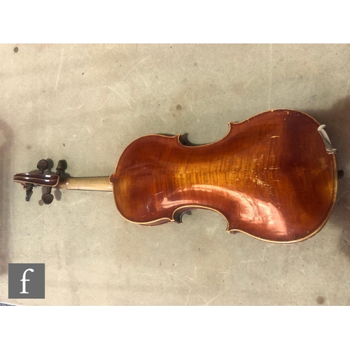 574 - A late 19th early 20th Century violin, length 34cm, with bow, in modern blue zip case and with origi... 