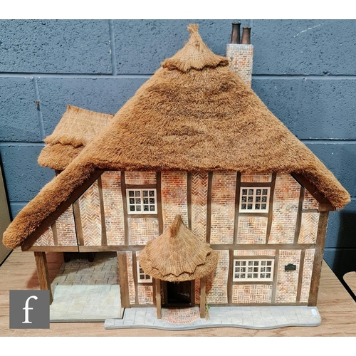 1184 - A Little Homes of England 1:12 scale dolls house modelled as a thatched cottage by Graham Wood, two ... 