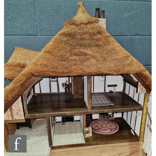 1184 - A Little Homes of England 1:12 scale dolls house modelled as a thatched cottage by Graham Wood, two ... 