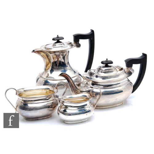 1 - A hallmarked silver four piece boat shaped tea set of plain form, total weight 60oz, pots with turne... 