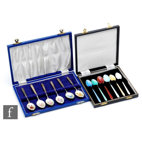 105 - Two cased sets of six hallmarked silver teaspoons, one set with enamelled floral decoration to bowls... 