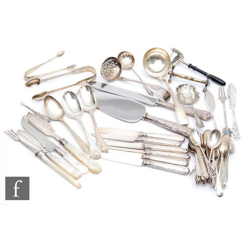 113 - A parcel lot of assorted hallmarked silver flatware to include tea and dessert spoons, a meat skewer... 