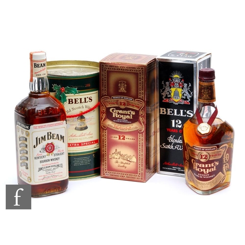 1156 - A group of blended whiskies and bourbons, to include a bottle of Jim Beam, two bottles of Grant's Ro... 