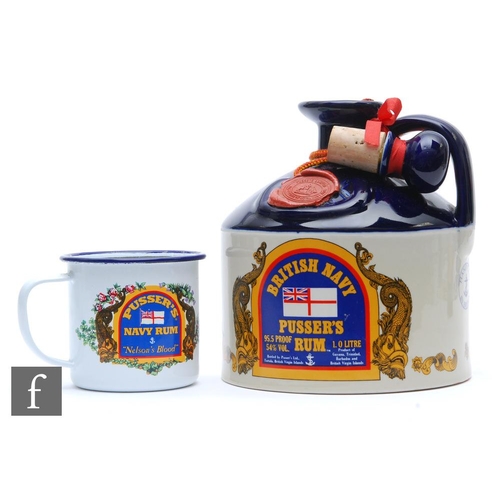 1161 - A British Navy Pusser's Rum, 1 litre decanter, sealed with contents, together with Pusser's Rum enam... 