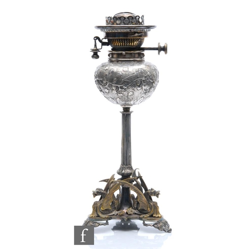 126 - A late 19th Century silver plated oil lamp in the manner of Elkington & Co, the triform griffin ... 