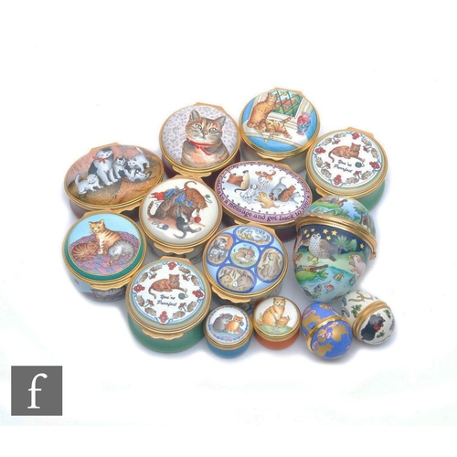 162 - Fourteen cat themed Halcyon Days enamel pill boxes each decorated with scenes of cats to include two... 