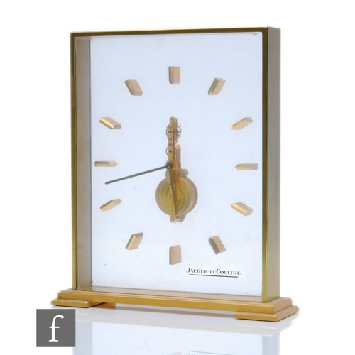 178 - A Jaeger Le Coultre skeleton clock within twin glass panels and brushed gilt frame, height 20cm, S/D... 