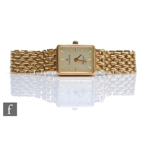 219 - A lady's 9ct hallmarked Sovereign quartz wrist watch, batons to a rectangular champagne dial and int... 