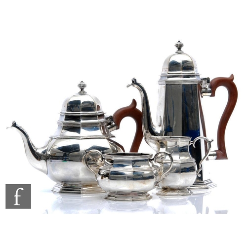 46 - A hallmarked silver four piece tea set of plain octagonal faceted form in the Queen Anne style, pots... 