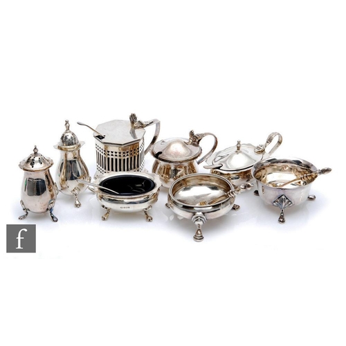 65 - A parcel lot of hallmarked silver condiments to include three mustard pots, three open salts and two... 