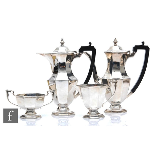 96 - A hallmarked silver pedestal, octagonal shaped, four piece cafe au lait set, pots terminating in scr... 