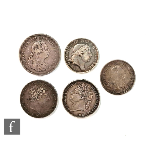 779 - Two George III to George IV crowns dated 1820 and 1821, also a 1804 dollar and two three shilling ba... 