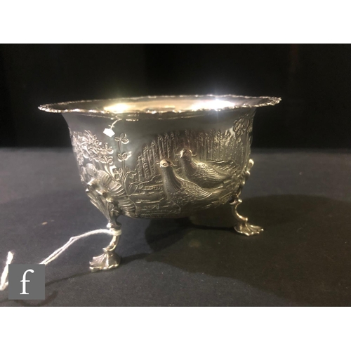 90 - A late Victorian sugar bowl decorated with embossed and engraved scene of two pheasants in a landsca... 